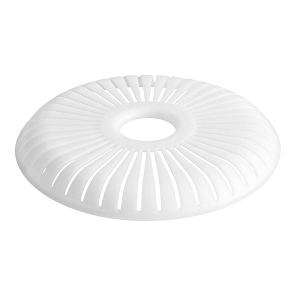 A white, round, plastic strainer with a central hole and radiating slits.