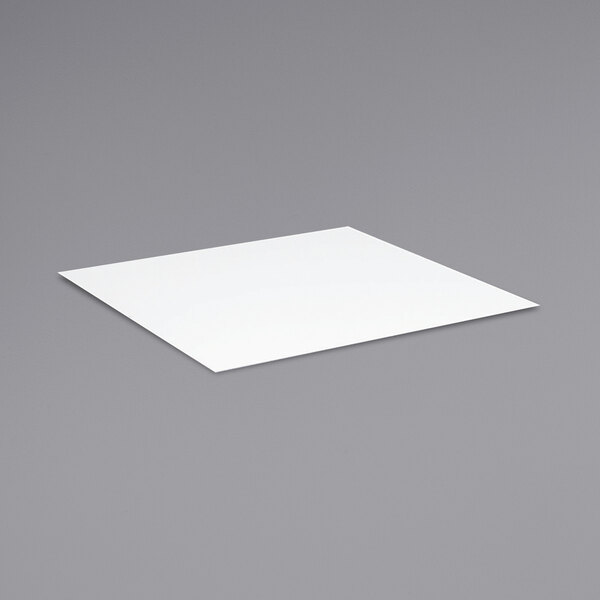 A white square on a gray surface.