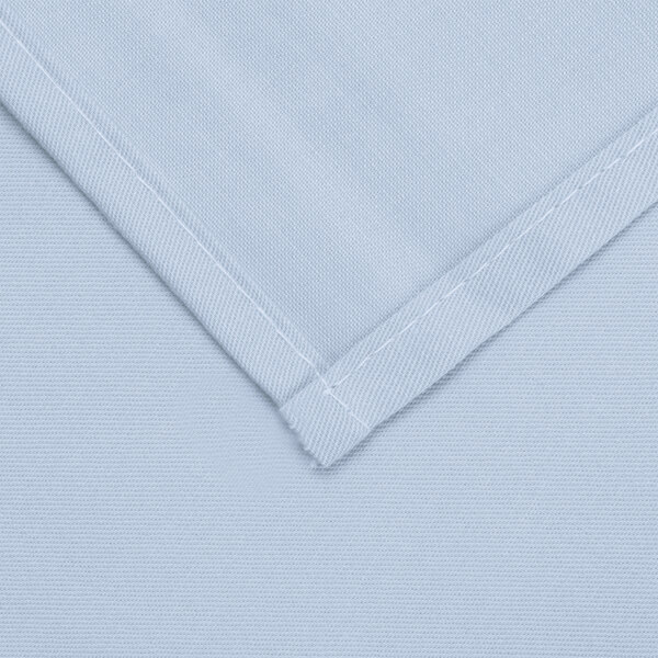 A light blue cloth table cover with a white hem.