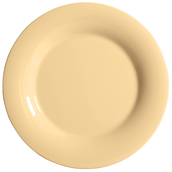 A white melamine plate with a wide yellow rim.