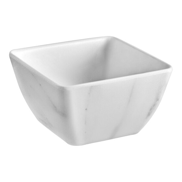 A white marble-patterned square melamine bowl with a 19 oz. capacity.