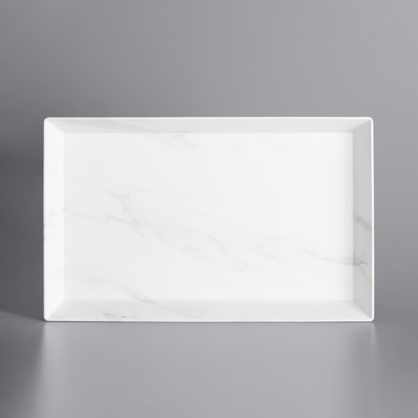 An American Metalcraft white rectangular melamine tray with a marble surface and gray border.