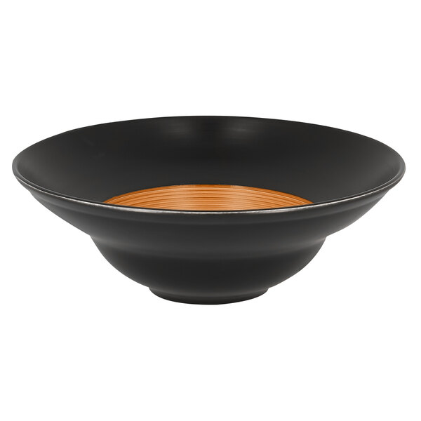 A black porcelain plate with a brown stripe.
