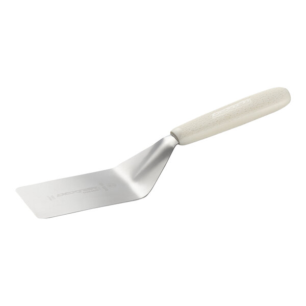A metal spatula with a white textured handle and a flat, rectangular blade.