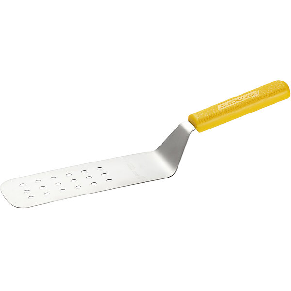 A Dexter-Russell perforated turner with a yellow handle.