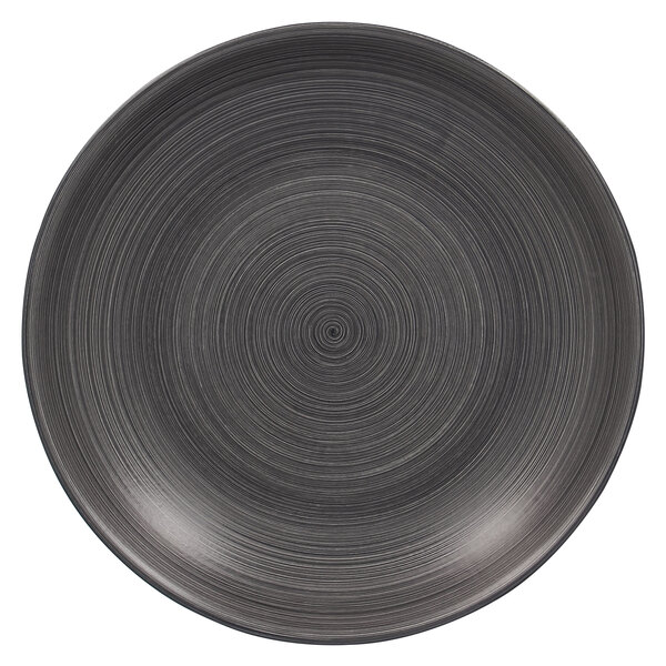 a black plate with a spiral pattern