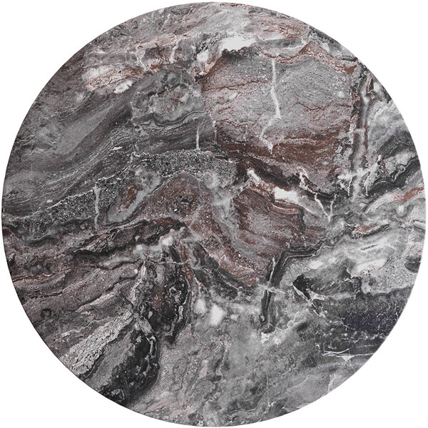 A round marble table with a circular pattern on the surface.