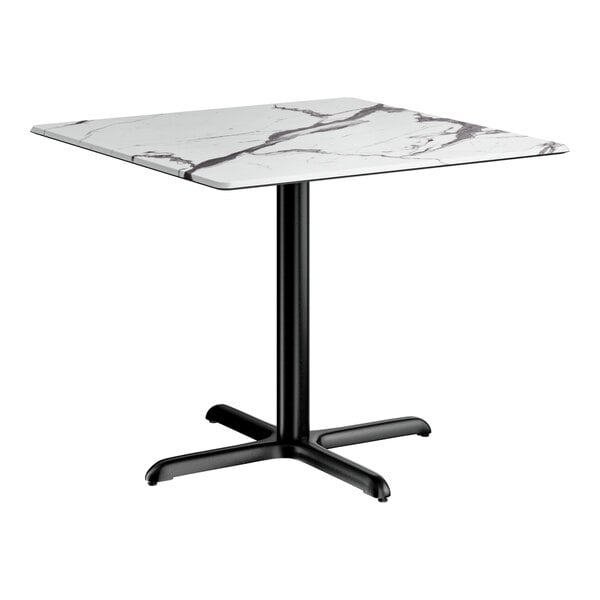 A square standard height table with a smooth white Versilla finish top and a black cross base plate.