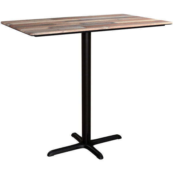 A Lancaster Table & Seating rectangular bar height table with a textured wood plank top and black cross base.