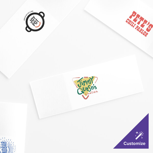 White rectangular self-adhering customizable paper napkin bands with different designs on them.
