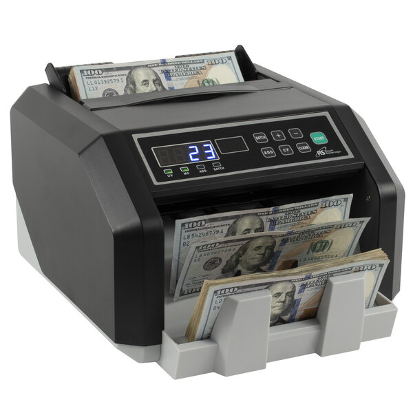 a stack of money in a black box