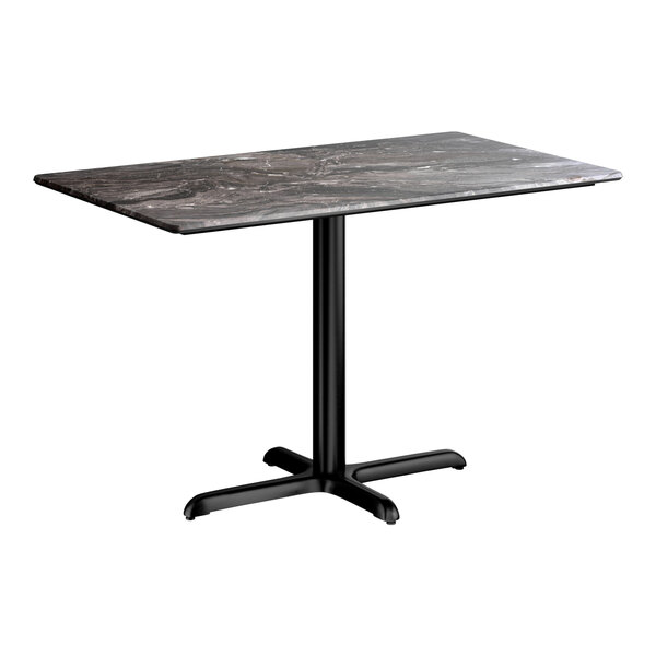 A rectangular standard height table with a smooth dark finish top and a black cross base plate.