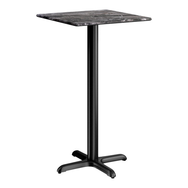 A square bar height table with a smooth dark finish and a black cross base plate.