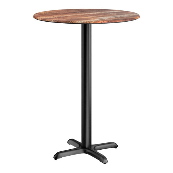 Lancaster Table & Seating Excalibur 32" Round Bar Height Table with Textured Yukon Oak Finish and Cross Base Plate