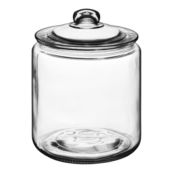 A clear glass jar with a matching glass lid.