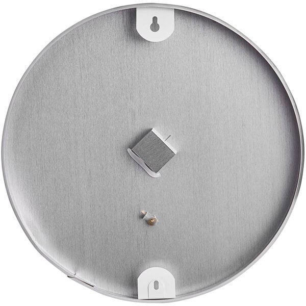 A silver round wall thermometer with a white face and a square hygrometer in the middle.