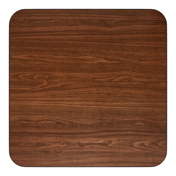 A 30-inch by 30-inch laminated square table top with a reversible walnut and oak finish.