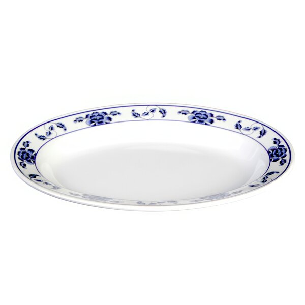 A white Thunder Group melamine platter with blue lotus designs.