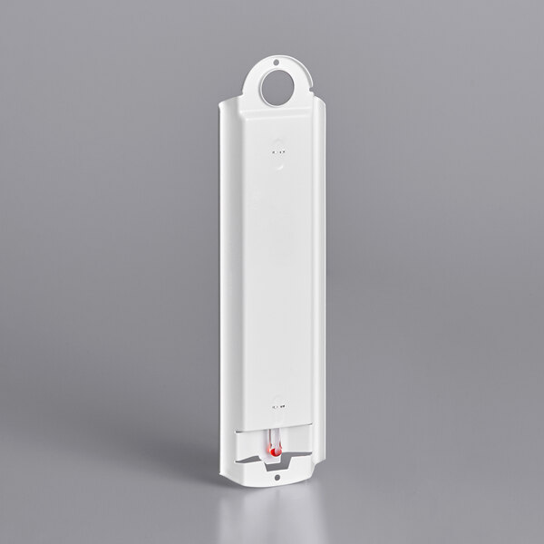 A white rectangular Taylor wall thermometer with a hole in the top.