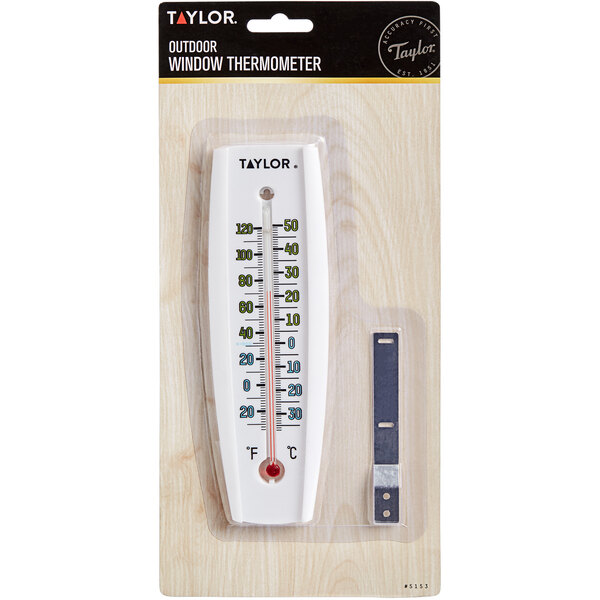 A white Taylor outdoor window thermometer in a package.