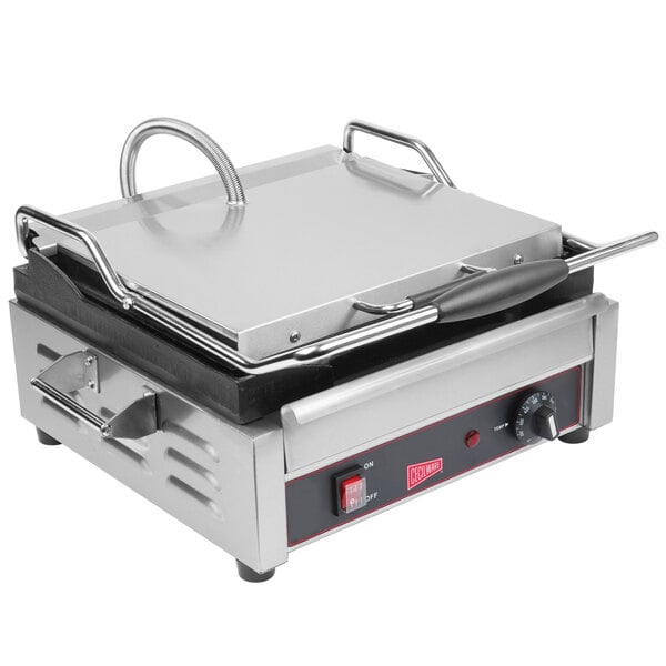 A Cecilware single panini grill with grooved surfaces and a lid with a handle.