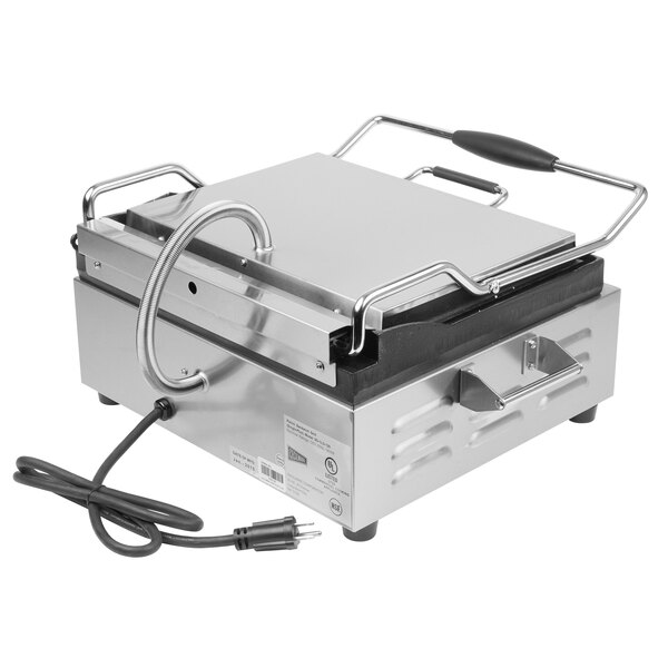 A silver Cecilware single panini grill with grooved surfaces and a cord.