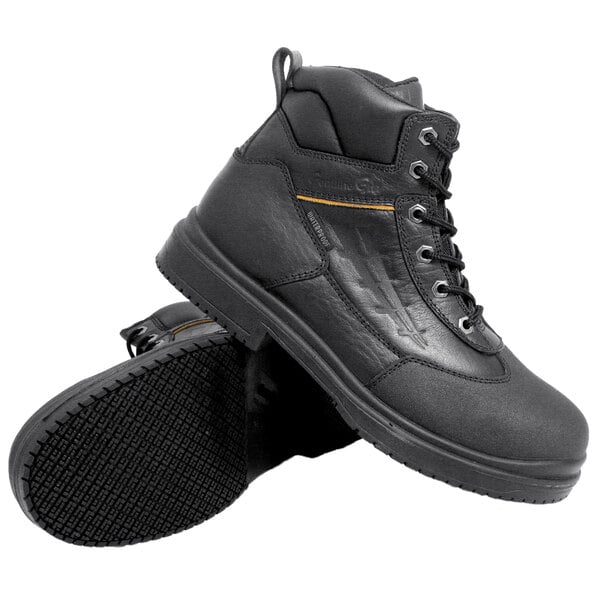 A pair of Genuine Grip black steel toe work boots.