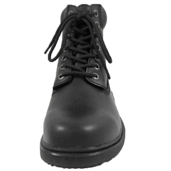 A close-up of a Genuine Grip black leather boot with laces.