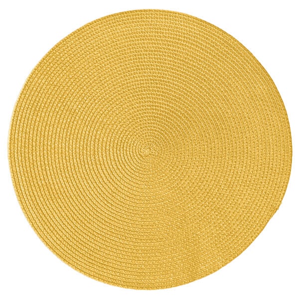 A close-up of a yellow woven RITZ® round polypropylene placemat.