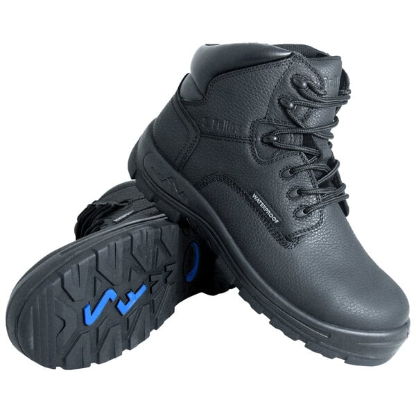 A pair of Genuine Grip black leather composite toe boots with blue laces.