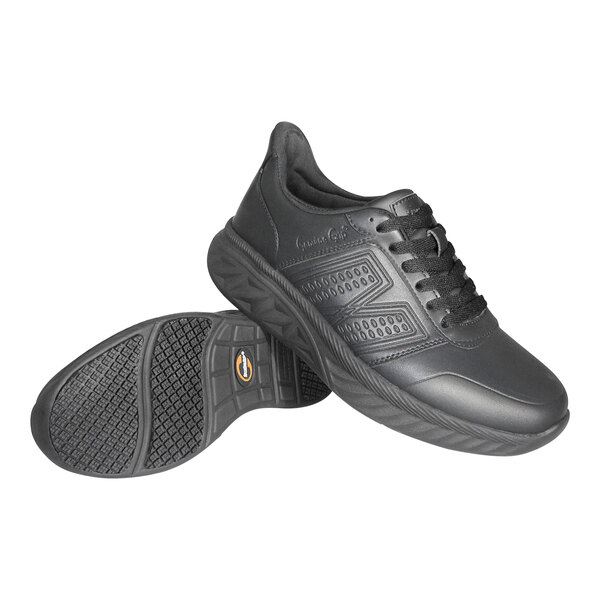 A pair of Men's black athletic shoes with a rubber sole.