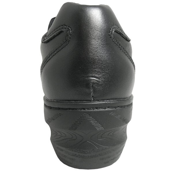 The bottom of a black Genuine Grip women's leather clog.
