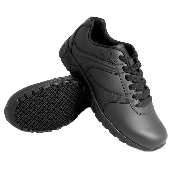 A pair of black athletic shoes with plain toes, black laces, and textured non-slip soles.