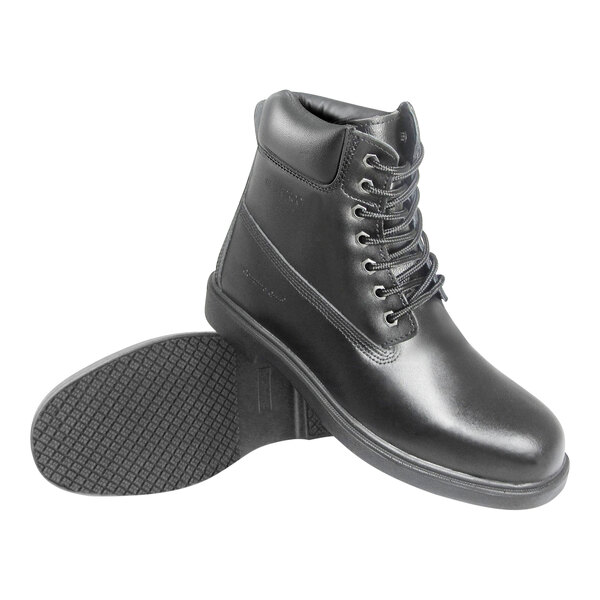 A pair of men's Genuine Grip black leather boots with laces and a black rubber sole.