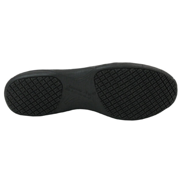 The black rubber sole of a Genuine Grip Men's Athletic Shoe.
