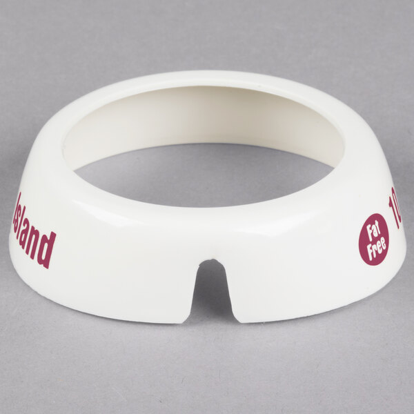 A white circular plastic collar with maroon lettering.