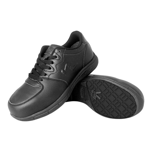 A pair of black athletic shoes with laces, one shoe standing upright and the other showing the textured sole.