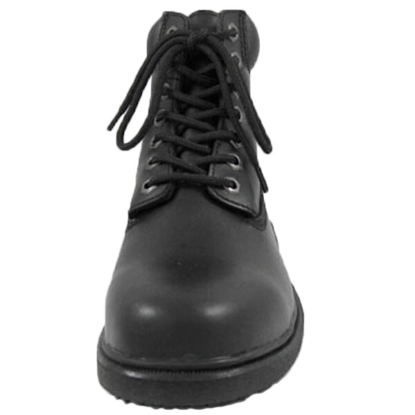 A close-up of a black Genuine Grip steel toe boot with laces.