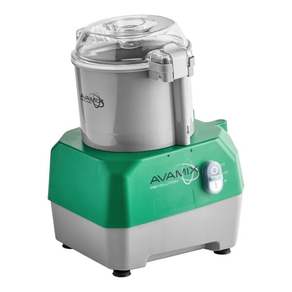 A gray and green batch bowl food processor with a clear lid and control switch.