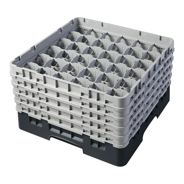 A black and gray plastic glass rack with 36 compartments and 5 extenders for holding and washing glassware.