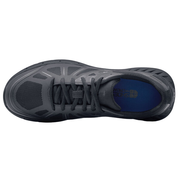 A black Shoes For Crews Men's Endurance II athletic shoe with a black sole.