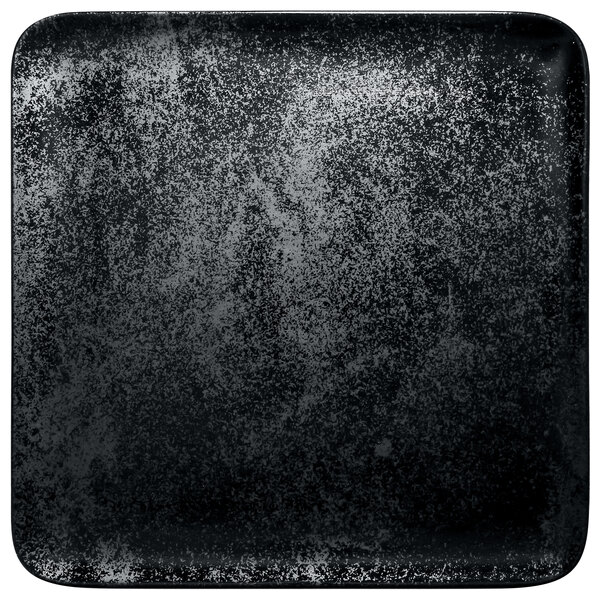 A black square RAK Porcelain plate with white specks.