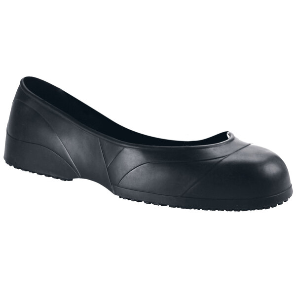A pair of black Shoes For Crews CrewGuard slip-resistant overshoes with a rubber sole.