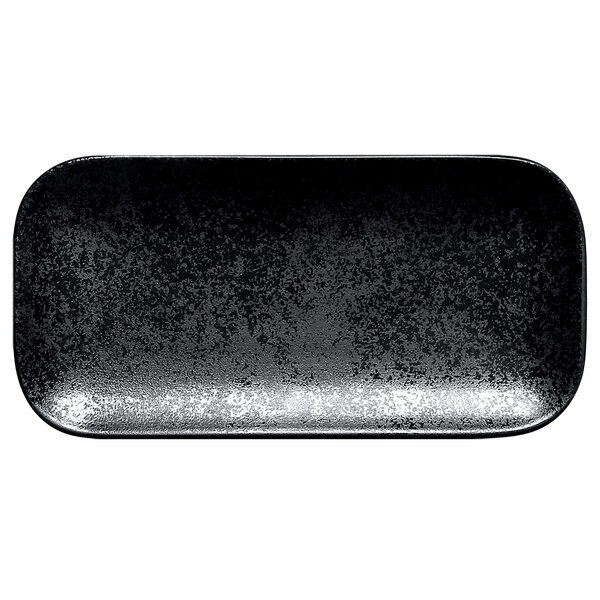 A black rectangular porcelain serving dish with specks on the rim.