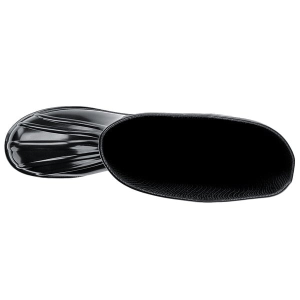 A close-up of a black Shoes For Crews Guardian IV steel toe work boot with a black rubber sole.