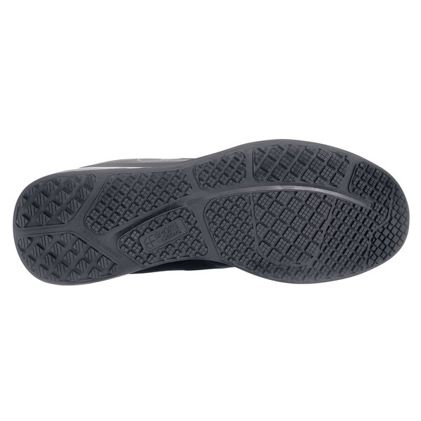 The black sole of a Shoes For Crews Men's Evolution II shoe.