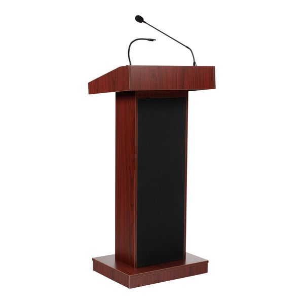 A wooden lectern with a mahogany finish, equipped with a built-in sound system and microphones.