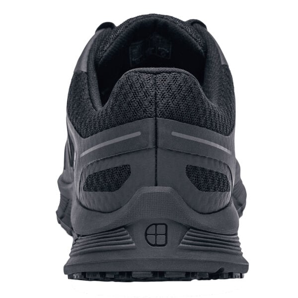 The back of a black Shoes For Crews Course women's athletic shoe.