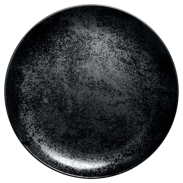 A white background with a black RAK Porcelain Karbon plate with specks.