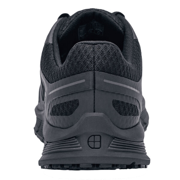 The back of a black Shoes For Crews Course women's athletic shoe.